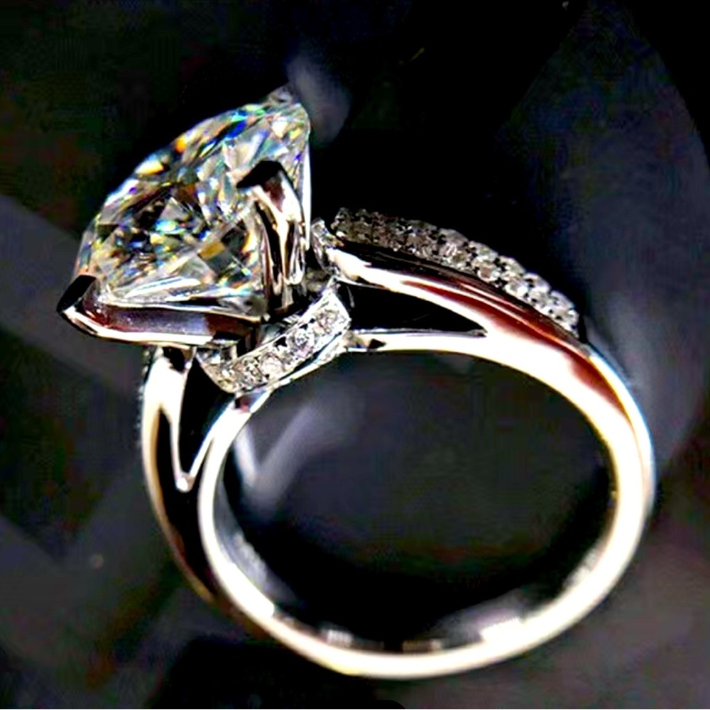 New 2ct. Zircon Vice Stone set in 925 silver plated with smaller stones below